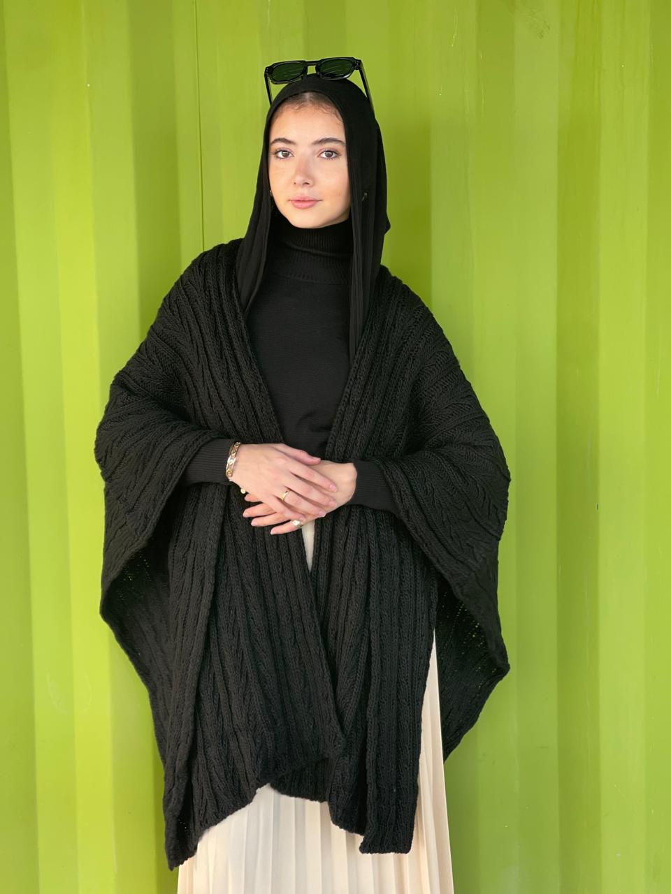 Cable-knitted Cape in dark blue
